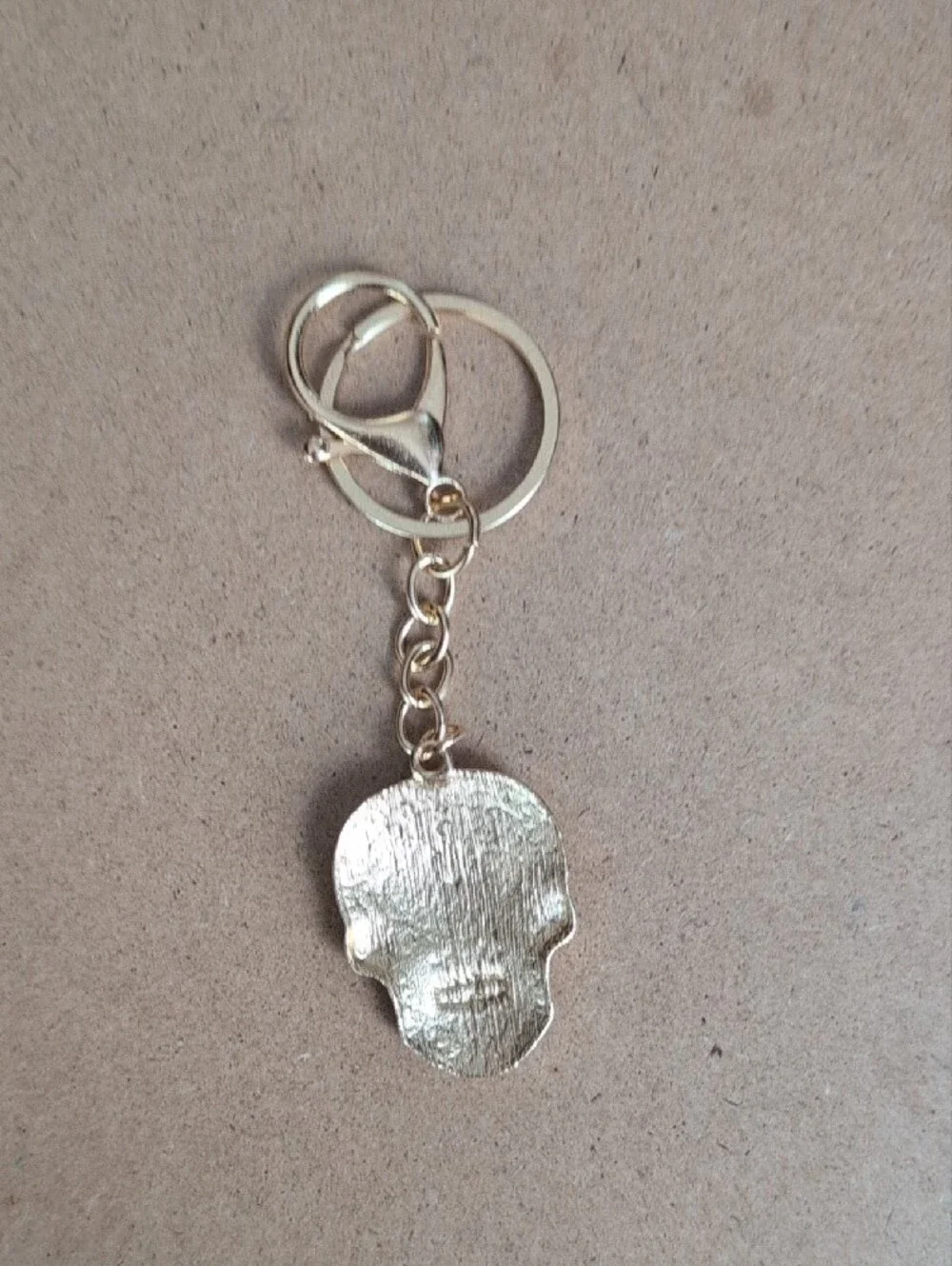 Gold-Tone White Sugar Skull Keychain by